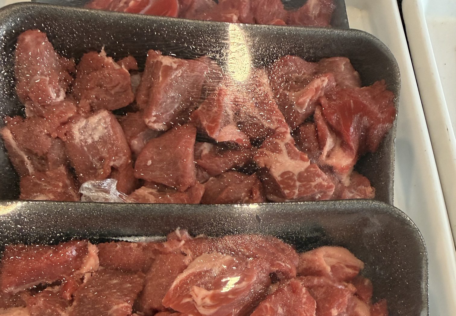 Trays of cubed boneless beef stew meat